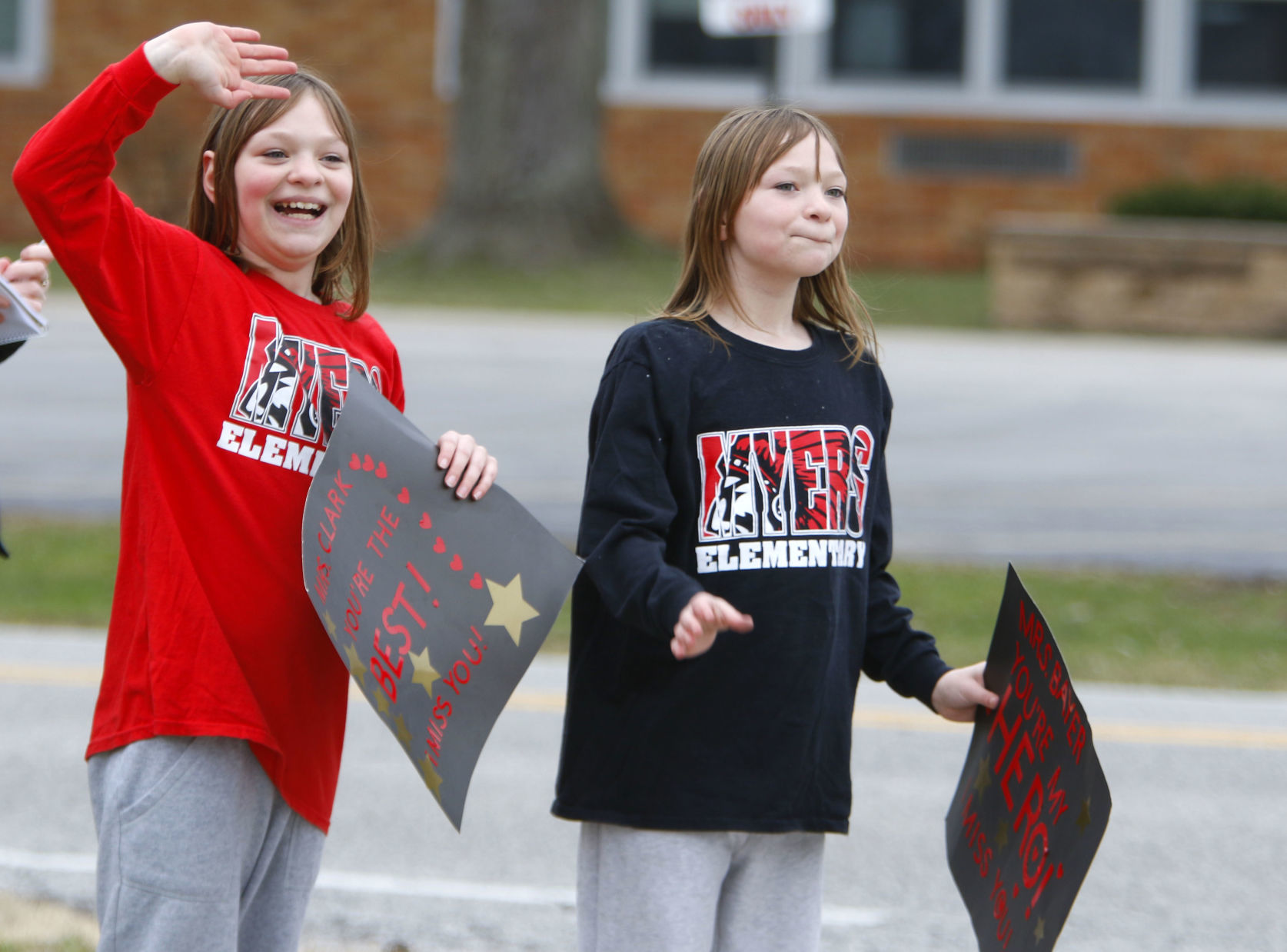 Myers Elementary staff parades through Portage neighborhood